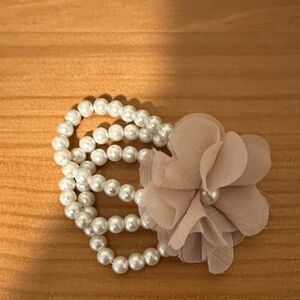Elegant Pearl Bracelet with Beige Flower
